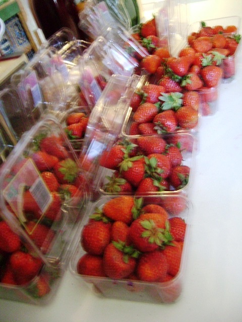 Strawberries Waiting To Be Sorted