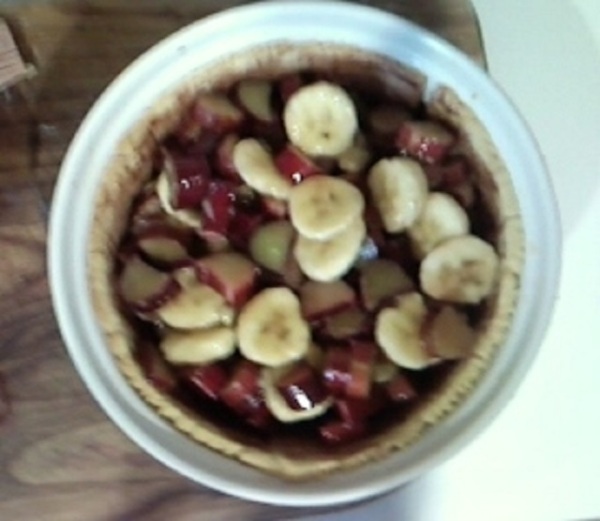 Banana and Rhubarb Pie ingredients loaded into crust